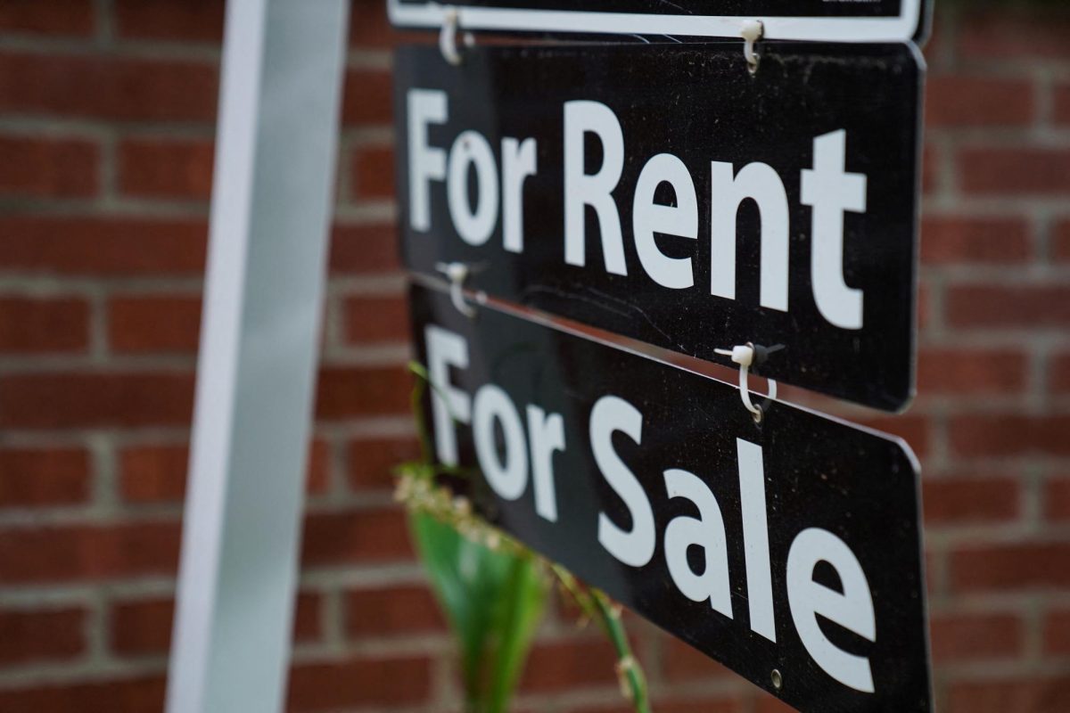 A "For Rent, For Sale" sign is seen outside of a home in Washington, U.S., July 7, 2022. REUTERS/Sarah Silbiger