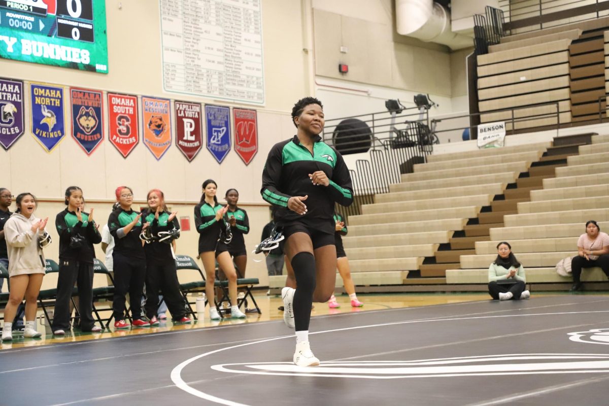 Senior Garianne Levy prepares to greet her opponent before a wrestling duel between Benson and Northwest on Dec. 4th.