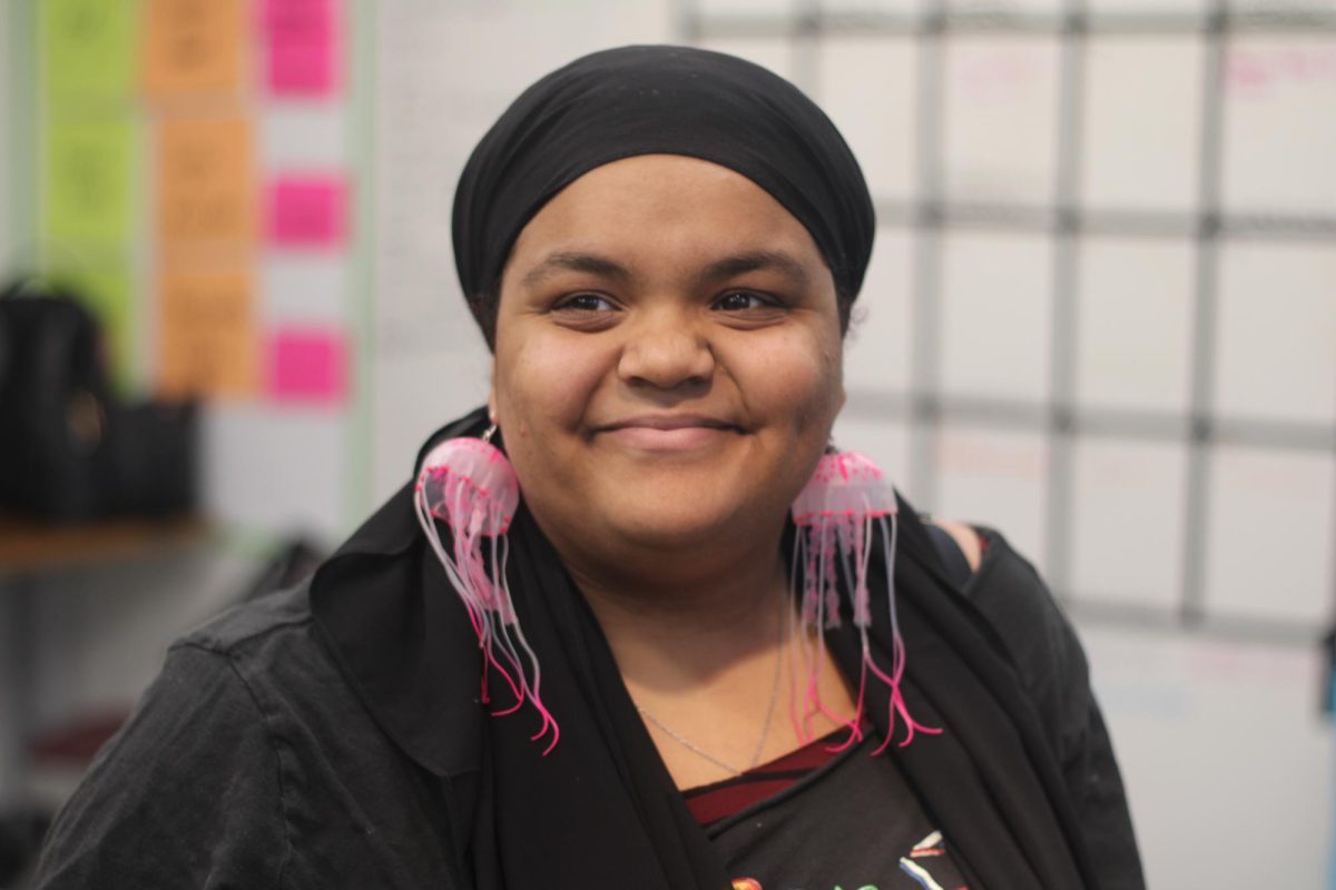 Senior Abigail Bryant showcasing her custom-made jellyfish earings